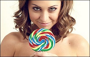 Young cutie Riley Reid playing with lollipop