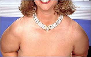 Big titted MILF Sarah Mercury shows off hot body