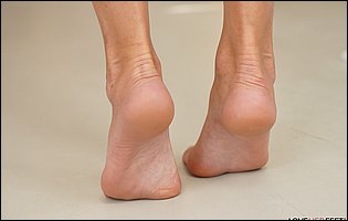 Gorgeous blonde MILF Shalina Devine exposing hot nude body and nice feet