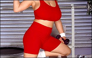 Beautiful busty sporty girl Sharday loves posing for camera
