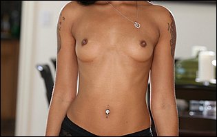 Skin Diamond in sexy t-shirt and jeans stripping and posing naked