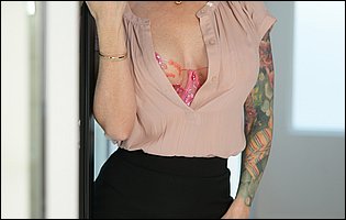 Gorgeous busty redhead Sophia Locke getting nude in the bathroom