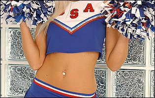 Hot cheerleader Sophie Moone posing and fingerfucking her pussy