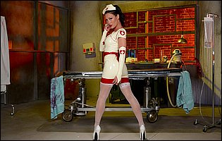 Hot nurse Starr Knight posing in white stockings and high heels