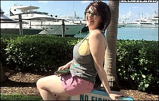 Cute busty brunette Tiggle Bitties poses for camera outdoor