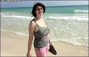 Cute busty brunette Tiggle Bitties poses for camera outdoor