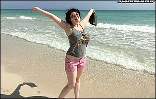 Cute busty brunette Tiggle Bitties poses for camera outdoor