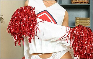 Sexy cheerleader Tina Martinez stripping and spreading her pussy