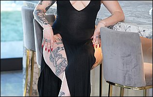 Vanessa Vega in long black dress shows off her nice feet