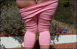 Virgo Peridot in pink yoga pants shows off her big ass.